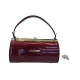 Vernika Glossy Vintage Barrel Clutch - Glagil